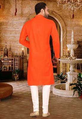 Dark orange cotton  kurta with pattern work and fancy button churidar 3