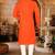 Dark orange cotton  kurta with pattern work and fancy button churidar
