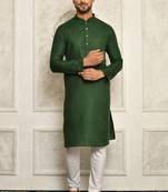 Bottle green cotton  kurta with pattern work and fancy button churidar