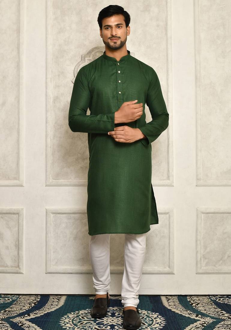 Bottle green cotton  kurta with pattern work and fancy button churidar