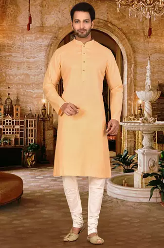 Beige cotton  kurta with pattern work and fancy button churidar