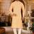 Beige cotton  kurta with pattern work and fancy button churidar
