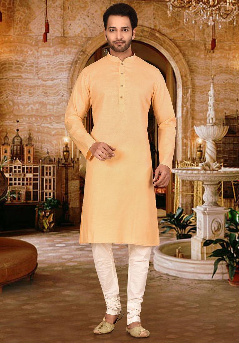 Beige cotton  kurta with pattern work and fancy button churidar