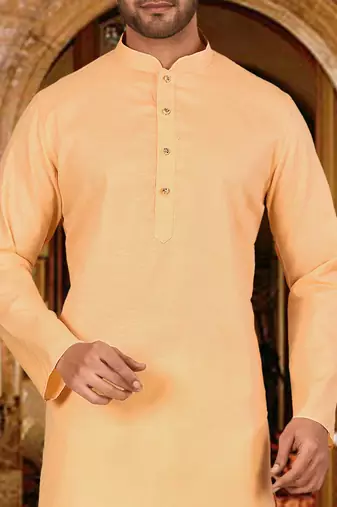 Beige cotton  kurta with pattern work and fancy button churidar