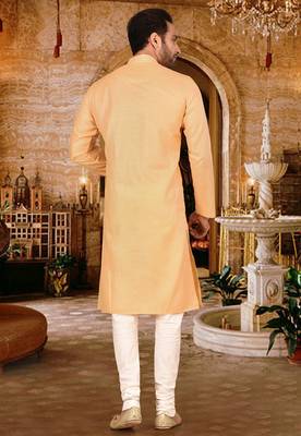 Beige cotton  kurta with pattern work and fancy button churidar 3