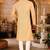 Beige cotton  kurta with pattern work and fancy button churidar