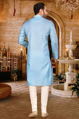 Sky blue cotton kurta with pattern work and fancy button churidar