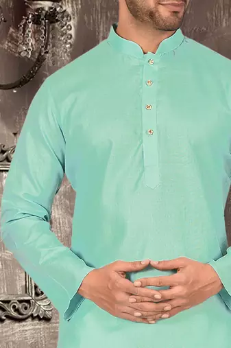Orange cotton kurta with pattern work and fancy button churidar