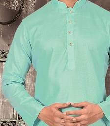 Orange cotton kurta with pattern work and fancy button churidar