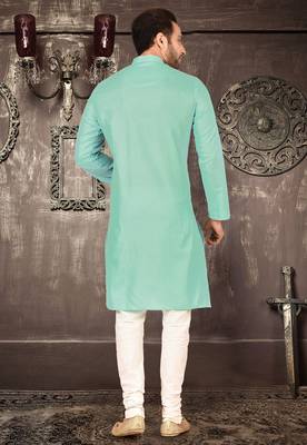 Orange cotton kurta with pattern work and fancy button churidar 3