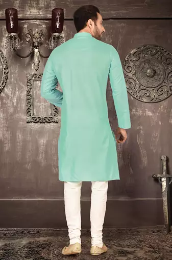 Orange cotton kurta with pattern work and fancy button churidar