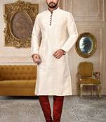 cream dupion art silk  kurta with  pattern work and 8 button