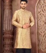 Beige  dupion art silk  kurta with machine dk work in front and hand