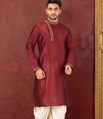Red dupion art silk  kurta with machine dk work in collar and button line