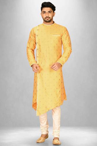 yellow fancy fabric  kurta with side open with pipein work
