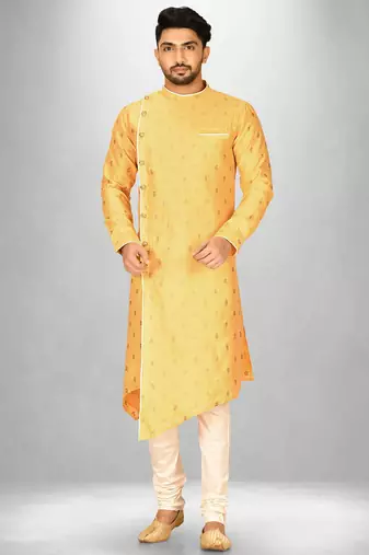 yellow fancy fabric  kurta with side open with pipein work