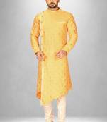 yellow fancy fabric  kurta with side open with pipein work