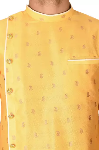 yellow fancy fabric  kurta with side open with pipein work