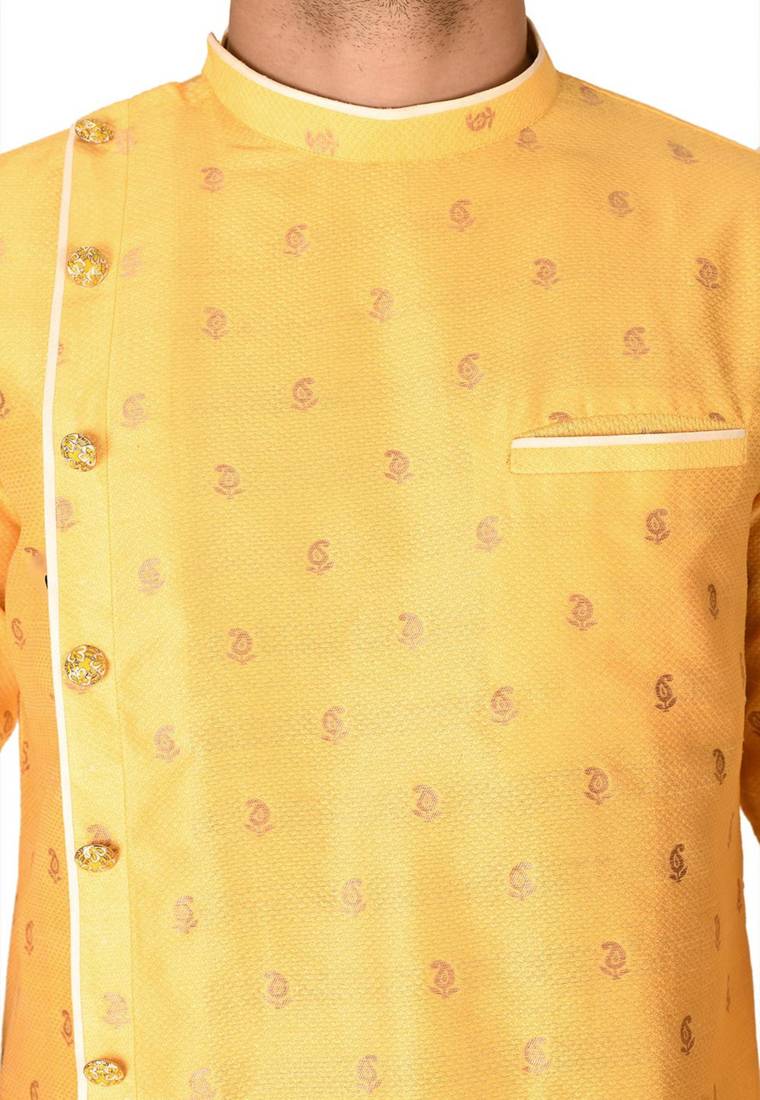 yellow fancy fabric  kurta with side open with pipein work