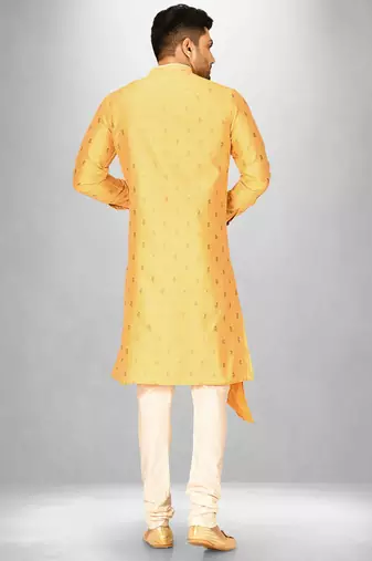 yellow fancy fabric  kurta with side open with pipein work