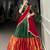 Traditional Silk Lehenga Set in Deep Green and Red with Ethnic Elephant Motif Border