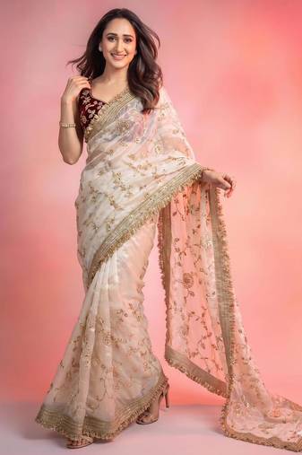 Cream satin embroidered saree with sequins work