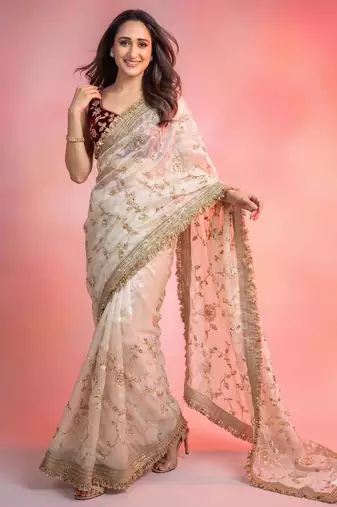 Cream satin embroidered saree with sequins work