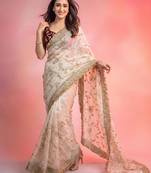 Cream satin embroidered saree with sequins work