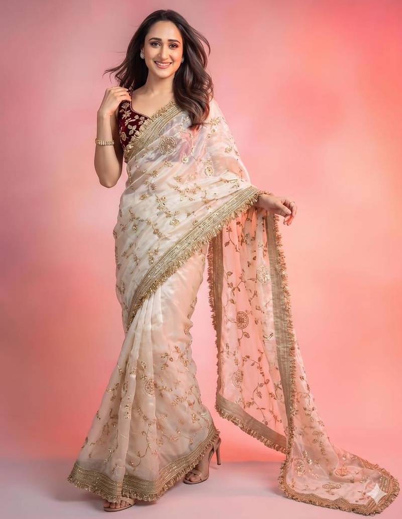 Cream satin embroidered saree with sequins work