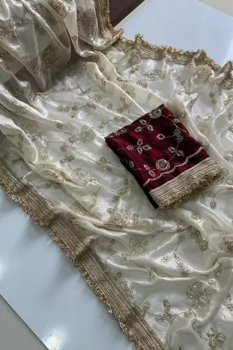 Cream satin embroidered saree with sequins work