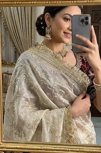 Cream satin embroidered saree with sequins work