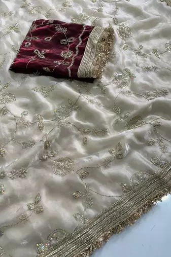 Cream satin embroidered saree with sequins work