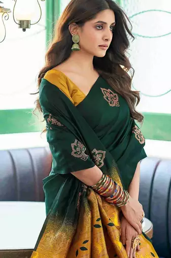 Green art silk woven saree with zari work