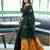 Green art silk woven saree with zari work