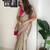 Beige tissue embroidered saree with sequins work
