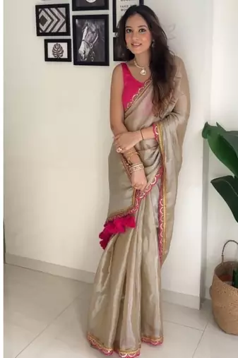 Beige tissue embroidered saree with sequins work