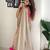 Beige tissue embroidered saree with sequins work