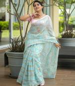 Sea green art silk printed saree with floral print