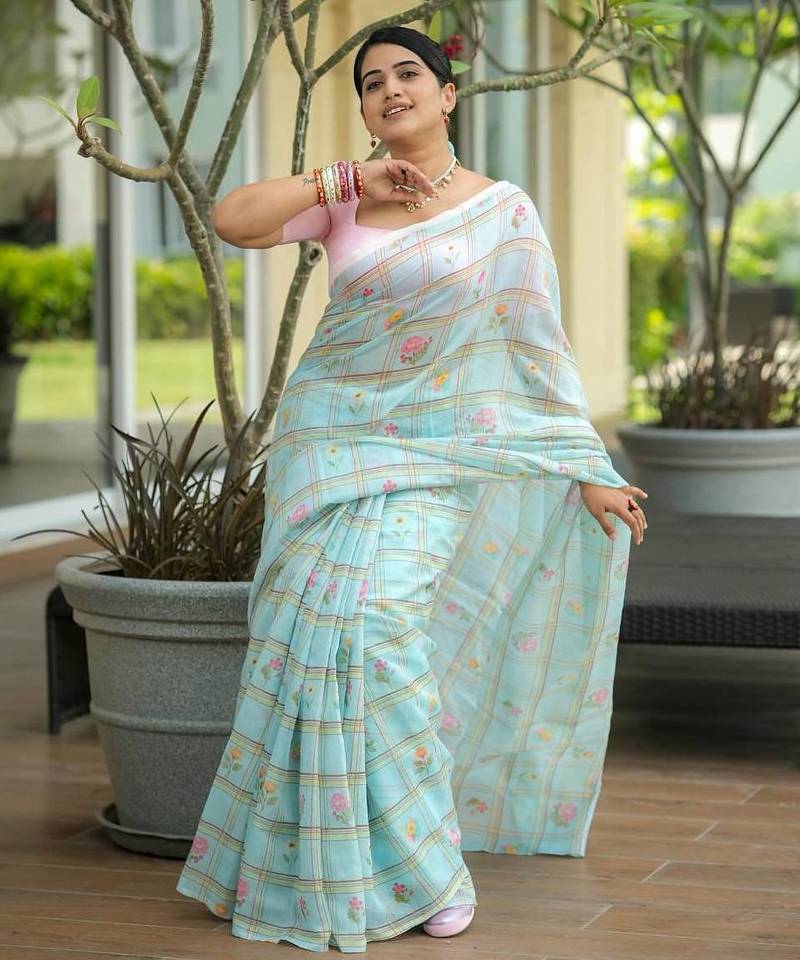 Sea green art silk printed saree with floral print