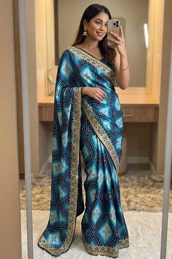 Teal silk blend embroidered saree with thread work