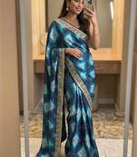Teal silk blend embroidered saree with thread work