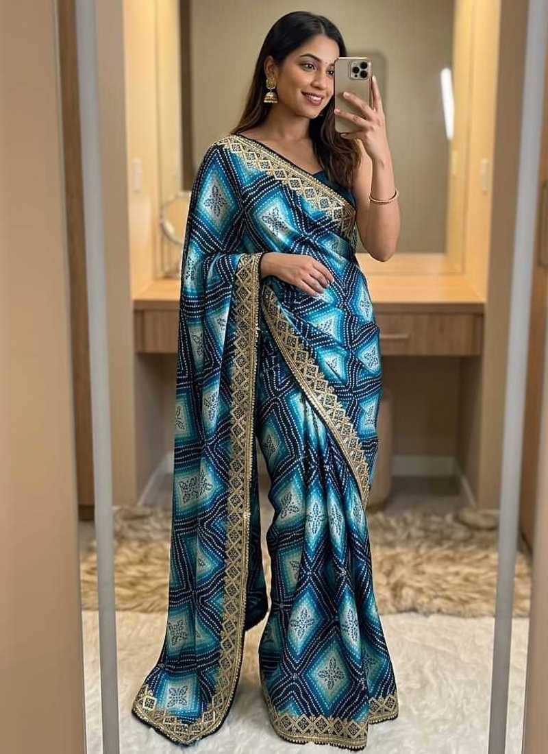 Teal silk blend embroidered saree with thread work