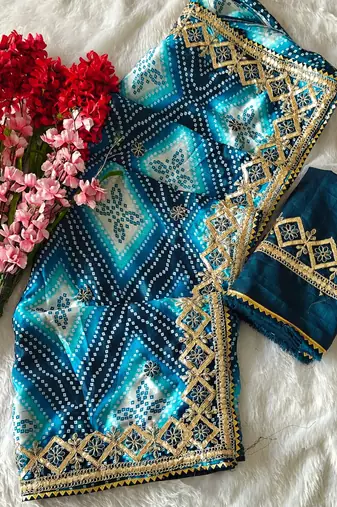 Teal silk blend embroidered saree with thread work