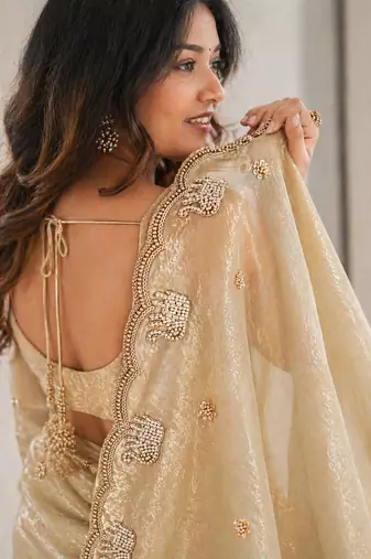 Beige satin embroidered saree with thread work