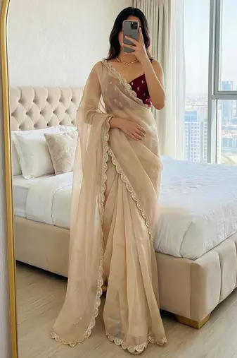Beige silk blend embroidered saree with thread work