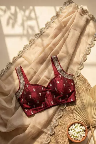 Beige silk blend embroidered saree with thread work