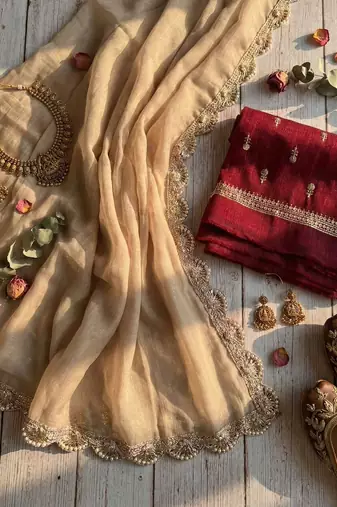 Beige silk blend embroidered saree with thread work