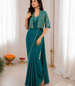 Teal silk blend embroidered saree with sequins work
