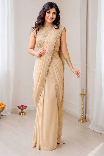 Beige georgette embroidered saree with sequins work