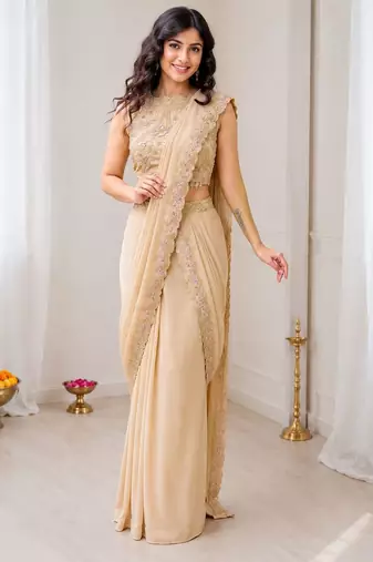 Beige georgette embroidered saree with sequins work